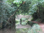 SX09626 Reflected bridge on Monmouthshire and Brecon Canal.jpg